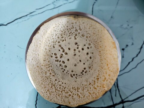 An appa or appam is a type of thin pancake originating from Sri Lanka. It is made with fermented rice batter and coconut milk,