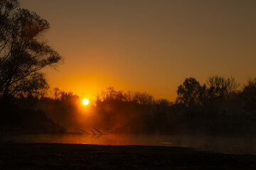 Fototapeta na wymiar Foggy sunrise over the Vistula River