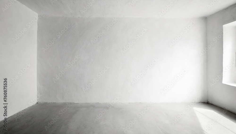 Aufkleber a large, empty room with a white wall and a window. natural light from the window illuminates the wh