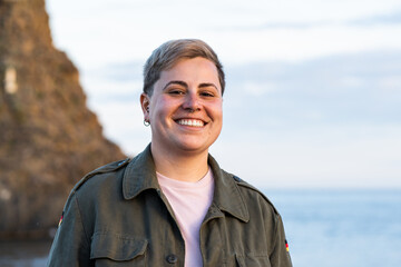 Joyful Seaside Portrait of a Young Non Binary Adult Person