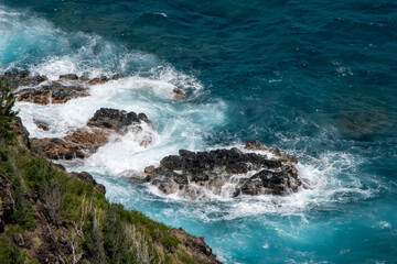waves crashing on rocks