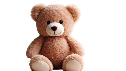 A brown teddy bear sits up against a plain white background
