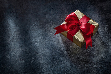 Square Golden Gift Box On Dark Background