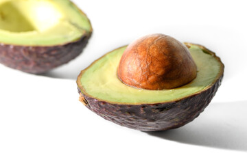 Half's of avocado isolated on white background