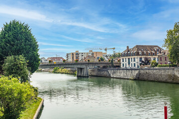 Beautiful view of the banks of the Seine River in the city of. Melun, Seine-et-Marne department, France. 
