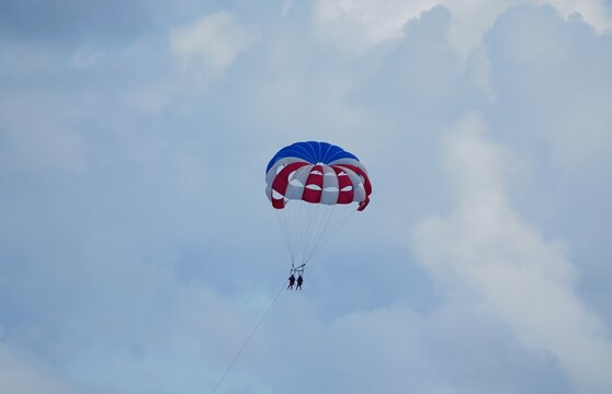 The distance view of people on parasailing excursion on a sunny day near St Thomas, U.S Virgin Island