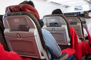 ROW OF AIRPLANE SEATS.