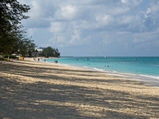 Soaking in the waves of Seven Mile Beach on Grand Cayman, Cayman Islands