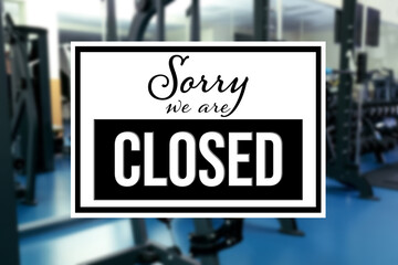Sorry we are closed sign against blurred background