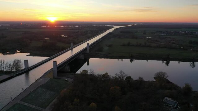 Sunset at the waterway junction, Mittelland Canal leads in trough bridge over Elbe, Magdeburg, Saxony-Anhalt, Germany, Europe