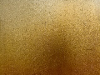 Gold cement wall texture and background 