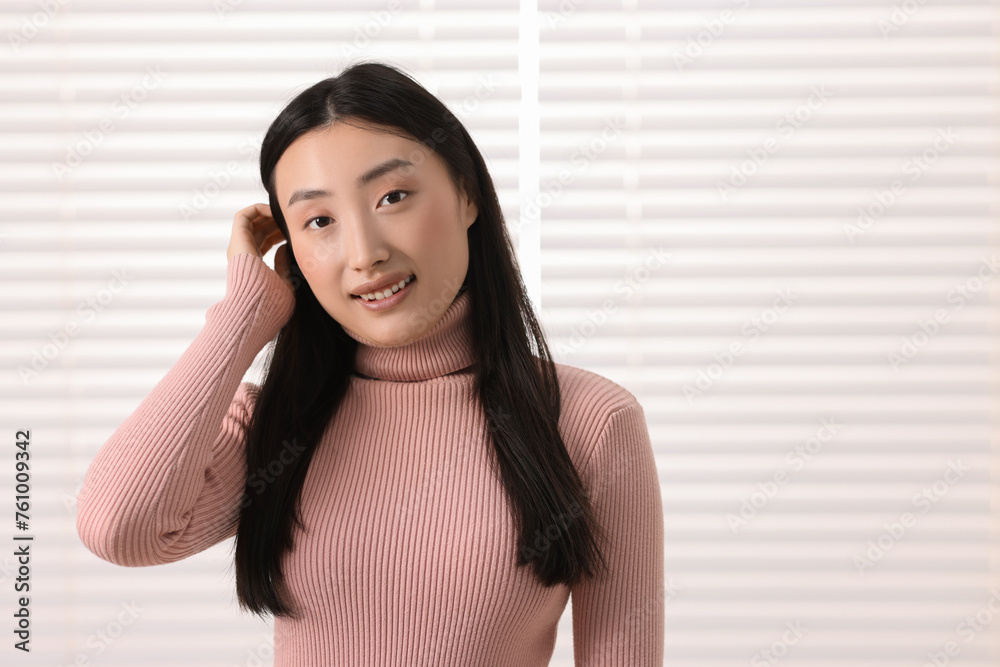 Sticker Portrait of smiling businesswoman in office. Space for text