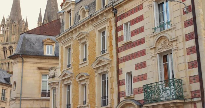 Elegant French architecture in Caen with intricate facades and balconies