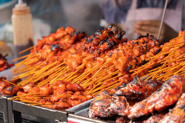 Satay or sate is a Southeast Asian form of kebab made from seasoned, skewered and barbecued meat,...