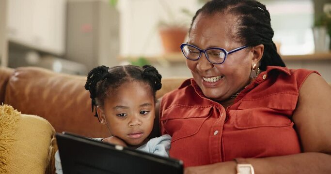 Love, tablet and grandmother hug kid on sofa with movie, streaming or Netflix cartoon at home. Digital, app or black family in living room watching video, film or bonding with games while babysitting