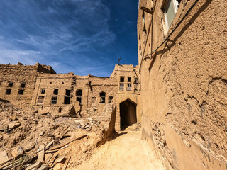 Falling down mud-brick ruins of the old village in Al Hamra, Oman