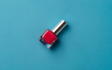 Nail polish on blue background. Manicure concept