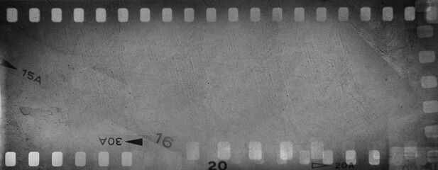 Film negatives frames grey background - 761037704