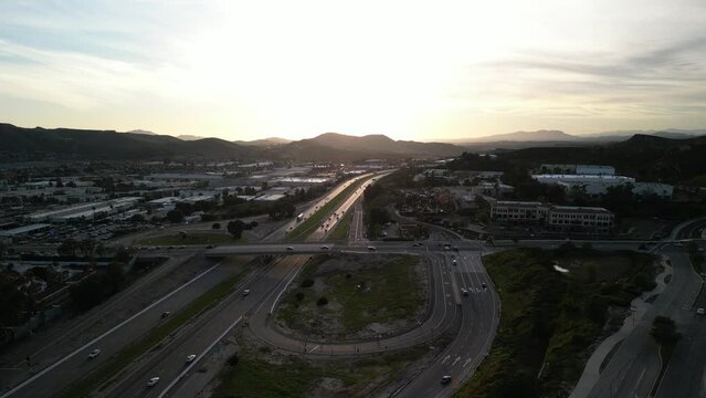 Aerial over Highway 118 in Simi Valley California at sunset in suburban area