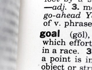 closeup of the word goal in the dictionary