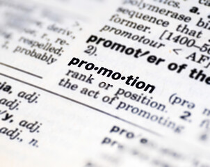 Closeup of the word promotion in the dictionary
