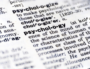 Closeup of the word psychology in the dictionary
