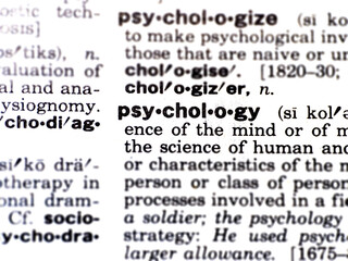 Closeup of the word psychology in the dictionary