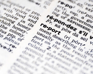 Fototapeta premium Closeup of the word report in the dictionary