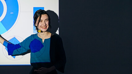 Caucasian woman giving a presentation using a projector