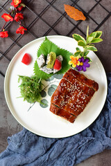 Delicious seafood and eel rice placed on a plate