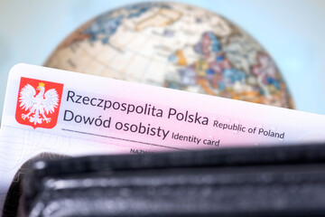 A globe and Polish identity card