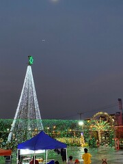A magical Christmas wonderland illuminated by a dazzling display of festive lights.