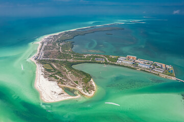 Island. Florida beaches. Panorama of Honeymoon Island State Park FL. Spring Break or summer vacation. Turquoise color of salt water. Ocean or Gulf of Mexico. Tropical Nature. Drone photo. Aerial view