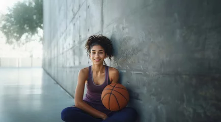 Foto op Plexiglas Woman with basketball, gym, relaxed pose, fitness. © Iona