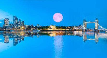 Panorama of the Tower Bridge and Tower of London on Thames river at twilight blue hour - London,...