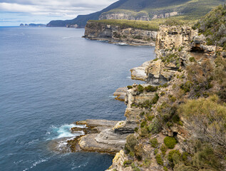 Sea cliffs on the coast of the  rugged Tasman Peninsula, Tasmania