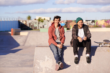 Skate park, portrait and skater friends relax outdoor after fun session, training or bonding on vacation. Skateboard, hobby and gen z male people chilling on a ramp for break, holiday or boarding © M S/peopleimages.com