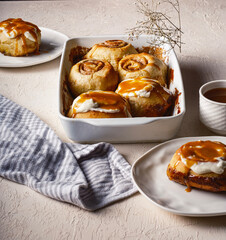 Cinnamon rolls airy breakfast with coffee and tea 