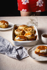 Cinnamon rolls airy breakfast with coffee and tea 