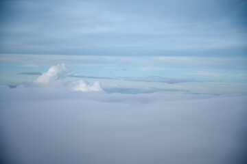 Naklejka na ściany i meble Clouds clean viewed from an airplane