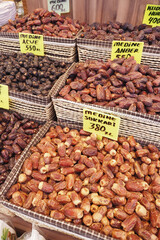  many date fruits display for sale at local market 