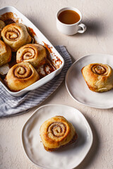 Cinnamon rolls airy breakfast with coffee and tea 