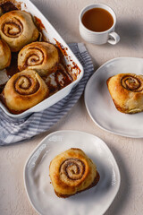 Cinnamon rolls airy breakfast with coffee and tea 