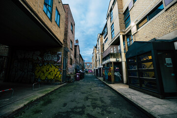Dark Ghetto street with grafitis in london