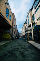 Dark Ghetto street with grafitis in london