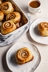 Cinnamon rolls airy breakfast with coffee and tea 
