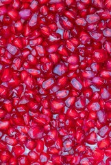 Top View of  Pomegranate Seeds Stack Background in Vertical Orientation