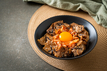 pork bulgogi rice bowl with kimchi and Korean pickled egg