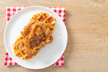 fried chicken waffle with honey or maple syrup