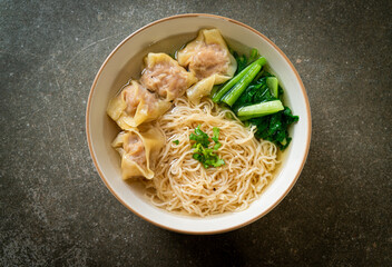 egg noodles with pork wonton soup or pork dumplings soup and vegetable
